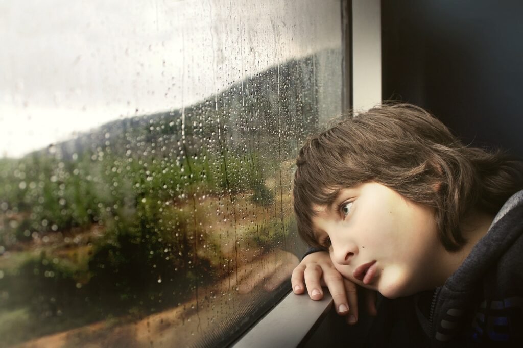 little boy, window, waiting, bored, tired, rainy weather, glass window, raindrops, water droplets, wet, kid, child, inside, train, looking out, boring, travel, rain, weather, water, droplets, sad, waiting, bored, tired, rain, rain, rain, sad, sad, nature, sad, sad, sad